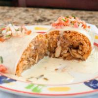 California Burrito · Grilled chicken or steak with Mexican rice and refried beans wrapped in a 12
