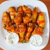 Chicken Wings · Choice of Hot, Mild, BBQ Or Buffalo Garlic Parmesan.