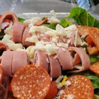Antipasta · Romaine, Tomatoes, Cucumbers, Red Onions, Mozzarella Cheese topped with Ham, Pepperoni, Sala...