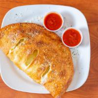 Create Your Own Calzone · Includes any one topping.