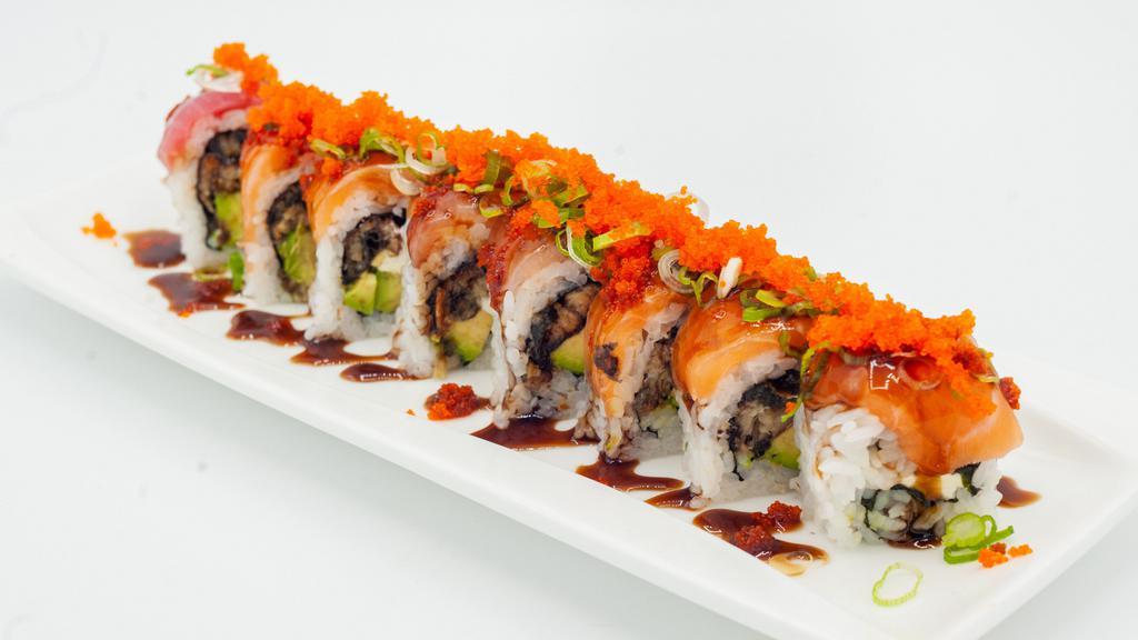 Out Of Control Roll · Eel, cream cheese, avocado topped with tuna, salmon, yellowtail, eel sauce, masago, and scallions.