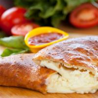 Calzone Style Cheese Bread · Delicious cheesy bread baked to perfection and folded.