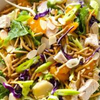 Chinese Chicken Salad · Shredded romaine, iceberg, and Napa cabbage, crispy rice noodles, toasted almonds, sesame se...