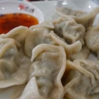 Chinese Chives Pork Dumplings · Seven Pieces.