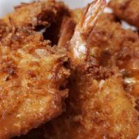 Coconut Shrimp · Shrimps rolled in a coconut breaded, tried to golden brown.