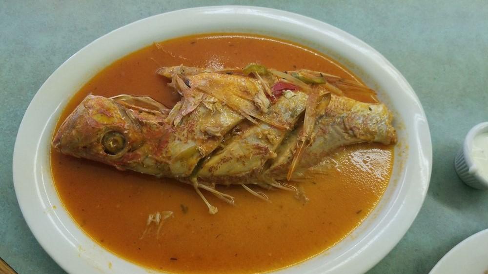 Stewed Red Snapper · Pwason et sauce. Fish served stewed in creole sauce. Red snapper stewed for hours in a flavorful creole sauce for a delightful flake.