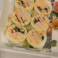 Special Cucumber Roll · Tuna, salmon, snow crab, squid salad and seaweed salad wrapped in cucumber with spicy mayo.