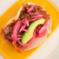 Crunchy Cheese · Corn tortilla, sirloin on a bed a crunchy cheese, avocado, sweet tangy pickled red onions.
