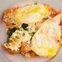 Breakfast Nachos – Chilaquiles · Corn tortilla chips with red salsa, beans, cheese, onions, cilantro, Mexican crema topped wi...