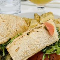 Pesto Caprese Sandwich · Marinated tomatoes, Siano fresh mozzarella, pistachio pesto, balsamic glaze, and fresh arugu...