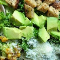Mexi Cali Caesar · Romaine, kale, roasted corn, avocado, housemade croutons and Cotija cheese with Cajun Caesar...