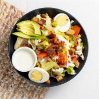 Cobb Salad · Romaine, locally sourced hickory bacon, blue cheese, red onion, tomato, roasted corn, avocad...