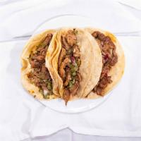 Grilled Steak Tacos (3 Pcs) · Served with a side includes beans, sour cream, pico de gallo, and tomatillo sauce.
