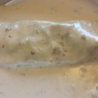 Chipotle Shrimp Burrito · Shrimp, Jack cheese, corn and our signature chipotle cream sauce all wrapped in a flour tort...