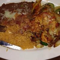 Pechuga Supreme · A premium chicken breast sauteed with bell pepper, onions, mushrooms, tomatoes, and cheese s...