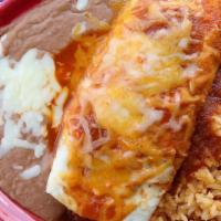 Burrito, Rice, And Beans · Kids' ground beef or shredded chicken burrito served with fresh rice and homemade refried be...