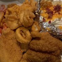 Seafood Plates · Fried seafood served with our house salad and your choice of buttered baked potato or French...