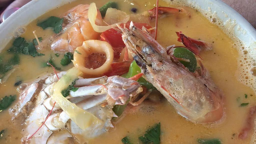 Seafood Soup · Milky and spicy soup made with crab, shrimp, fish, calamari, and vegetables. Served with a side of rice.