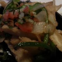 Vegetarian Fajitas · Vegetarian. Shrimp of marinated meat charbroiled on our grill. Served with pico De gallo, sm...