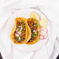 Street Tacos · Homemade tortilla topped with choice of meat, cilantro & onions. On the side: radish, cucumb...