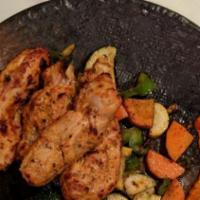 Tand. Chicken Tikka · Classic Chicken Tikka, Makhni Sauce, Seasonal Vegetables