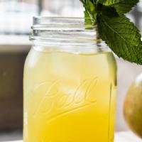 House Punch · made with fresh whole mangos, local spearmint and lime juice