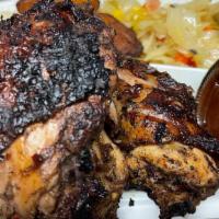  (White Meat )  Jerk Dinner · Jerk Dinner white meat Marinate in jerk Sauce Served with breast/ wing, Rice and beans, cabb...