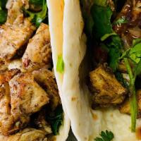 (3) Gully'S Chicken Street  Tacos  · 3 TACOS White meat marinated in jerk sauce serve w/cilantro, slice onion, topped with a swee...
