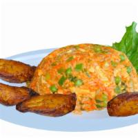 Vegan Chicken Rice · Yellow rice, vegan shredded chicken, carrots peas, red pepper, onions, garlic.