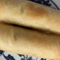 Egg Roll (1 Pc) (Lunch) · Savory filling wrapped in a paper-thin wrapper and deep-fried.