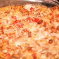 Burger Dip · The burger dip includes diced tomatoes,in house seasoned beef,and a 6 cheese blend to perfec...