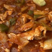 Arroz Con Pollo · Tender sliced chicken breast specially prepared with fresh mushrooms, onions, and green pepp...