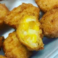 Corn Nuggets · Gold on top of gold! Crispy gold nuggets filled with deliciously sweet gold kernels! Can't g...