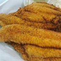 Flying Fish · Two delicious (golden fried or grilled] catfish fillets with all the fixings, you would've t...