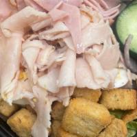 Flying Tosser · An out of this world, chef salad with the works! Comes with fresh ham and turkey.