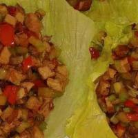 Lettuce Wrap · Red and green pepper, celery, corn, and vegan ham.