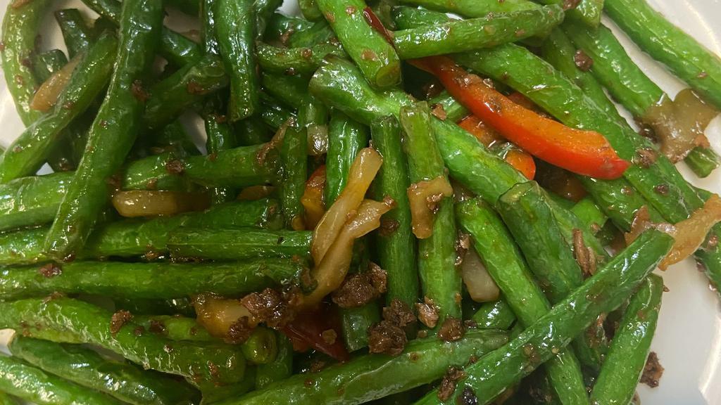 Dry Sautéed String Bean · Hot & spicy. Sauteed with red peppers and chinese pickles.