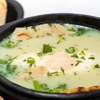 Changua · Sopa con leche y pan. / Soup with milk and bread.