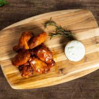 Wings N' More Wings · Classic bone-in wings oven- baked, cooked to order perfectly crisp, and tossed with your cho...