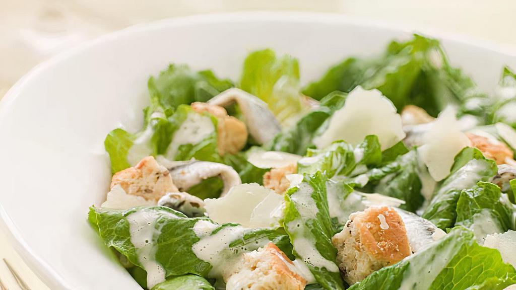 Chicken Caesar Salad · Crisp romaine, parmesan cheese, grilled chicken, house made croutons and caesar dressing.
