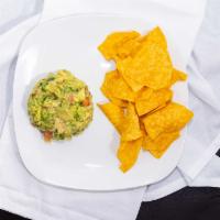 Chips With Choice Of Dip · Crunchy chips served with your favorite dip. Choose from cheese dip, bean dip or guacamole d...