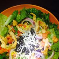 Bowl Salad · A bed of romaine lettuce with your choice of grilled chicken, steak or shrimp topped with co...