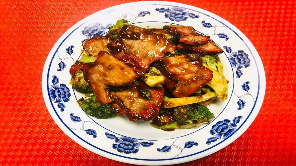 Roast Pork With Broccoli · Served with white rice.