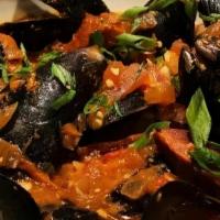 Moules Basquaise - Full · Chorizo, olive oil, lobster sofrito broth, piquillo peppers, Piment d'Espelette, and onions
