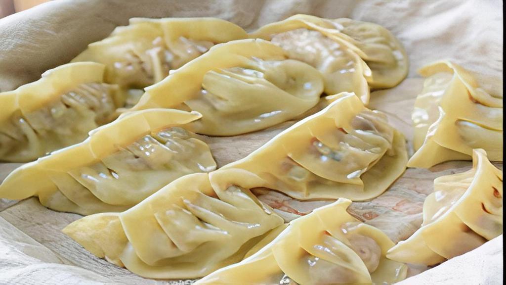 Steamed Pork Dumplings|돼지물만두 · Steamed pork dumplings (10 pieces)