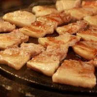 Sam Gyeop Sal|삼겹살 · Charcoal-grilled thick slices of pork belly meat served with lettuce. Comes with white rice