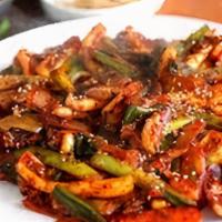 Squid Bokum|오징어볶음 · Squid, mushrooms, and vegetables stir-fried with spicy sauce. Comes with white rice.