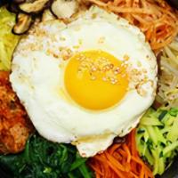 Stone Pot Bibimbap|돌솥비빔밥 · Assortment of lightly sautéed vegetables, fried egg, and choice of beef, spicy chicken, spic...