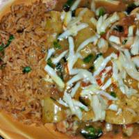 Enchiladas Seafood · With tilapia and shrimp.