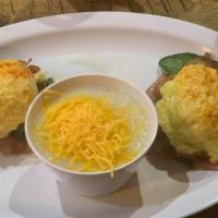 Eggs Benedict Florentine · Out with the ham and in with lightly sauteed spinach, two poached eggs, and famous hollandai...